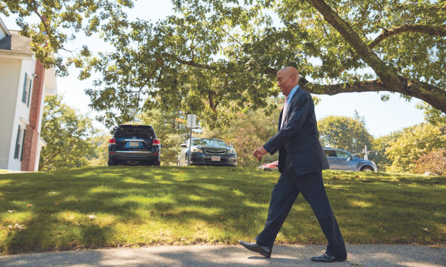 President Eric M. Turner walks around campus. 