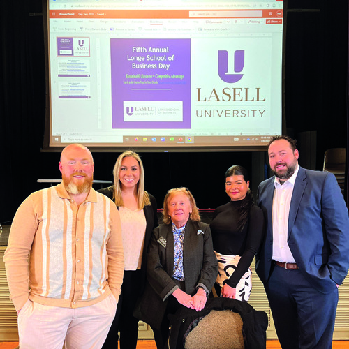 Michael Ketchen '06, Ally Chute '10, Aurialis Alvarez '18, and Kyle Ganley '05 (pictured from left with Professor Nancy Waldron) at Michal Longe '95 School of Business Day