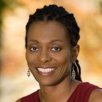 a smiling Black woman