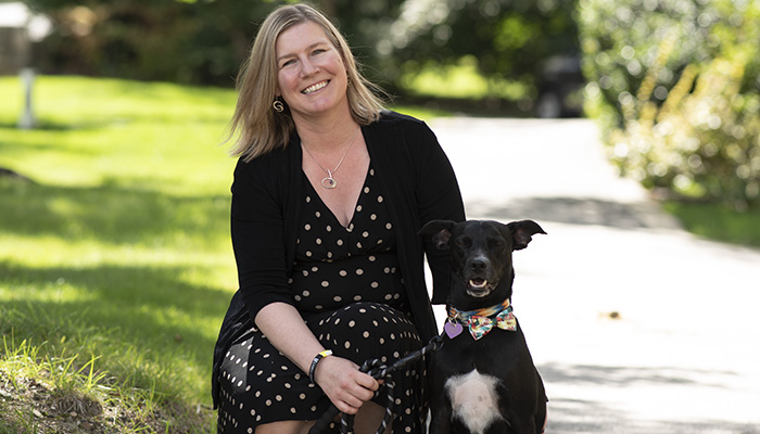 Chelsea Gwyther, VP for University Advancement, and her dog, Lito