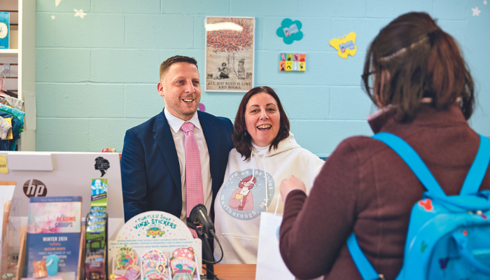 Marlborough Mayor J. Christian Dumais '02 with a local business owner