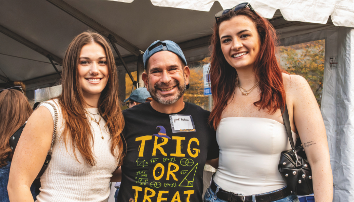 Professor Neil Hatem with Victoria Scambray ’25 (left) and Maddy Scully ’25