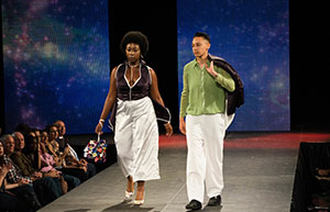 man and woman on fashion runway