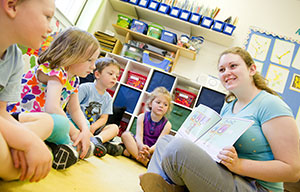 woman teaching preschoolers