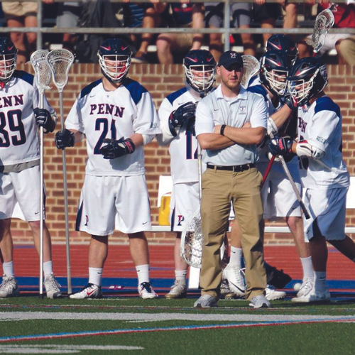 Anthony Erz '11 on the field as an athletic trainer for UPenn. 