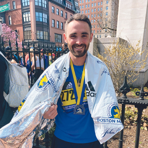 Jonathan Klippert '12 after running the Boston Marathon for Lasell