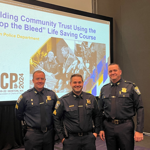 John Fitzgerald '24 (left) with colleagues at a conference