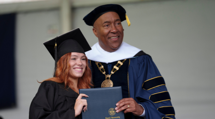 Lasell student with President Eric Turner at 2025 Commencement