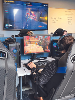 Students in the Esports and Gaming Lab at Lasell University