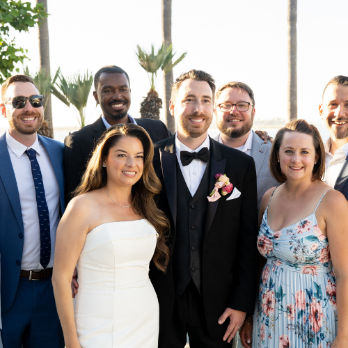 Scott Bacon '10 and Lasell alumni at his wedding