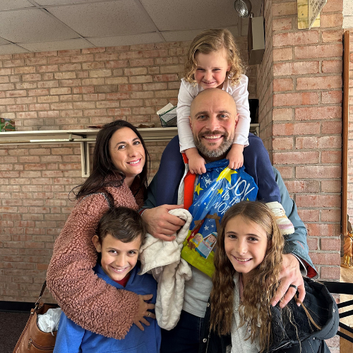 Lisa Feniola Daniele '07 and family