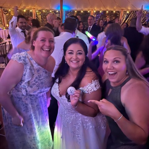 Alyssa Nahigian '16 with Lasell alumni at her wedding