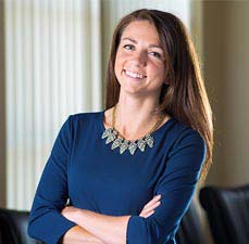 student with arms crossed