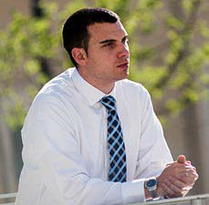 student standing outside